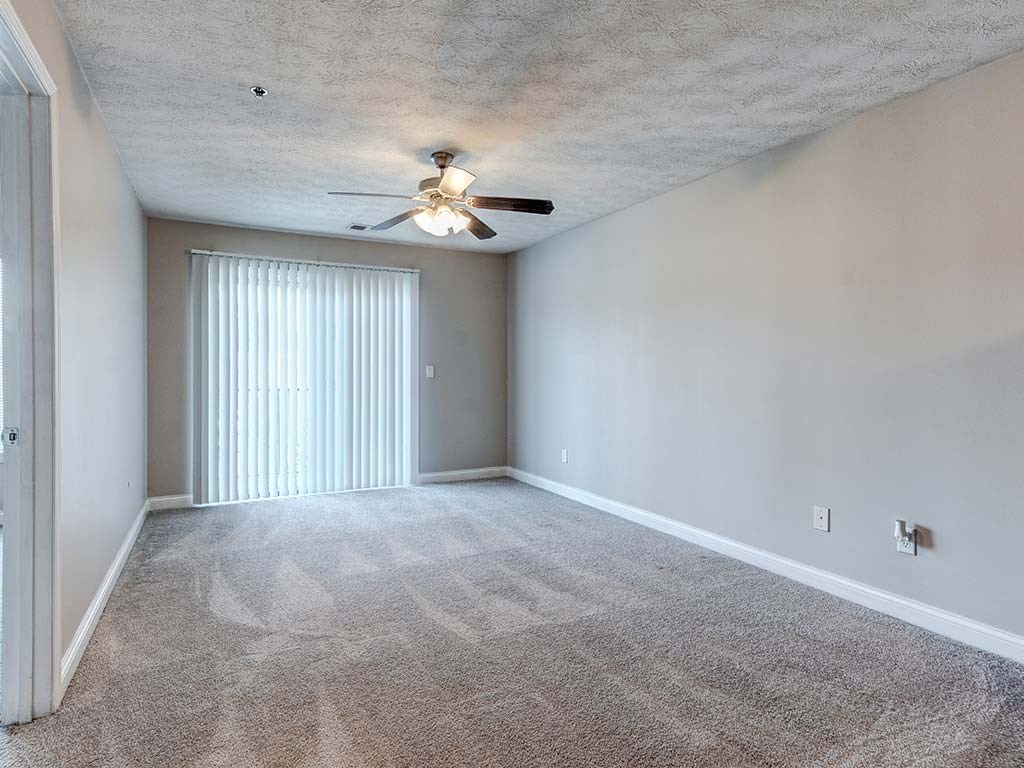 Spacious living room with private balcony at HUB of New Albany, New Albany, IN, 47150