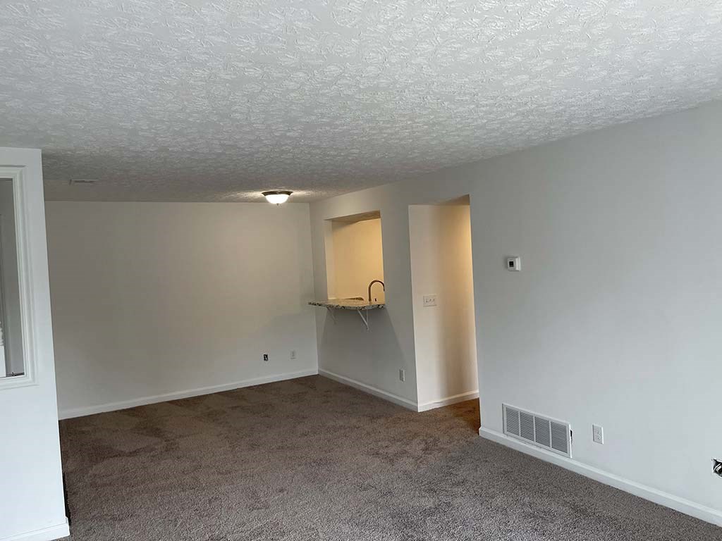 Spacious living room at Camelot East Apartments, Ohio