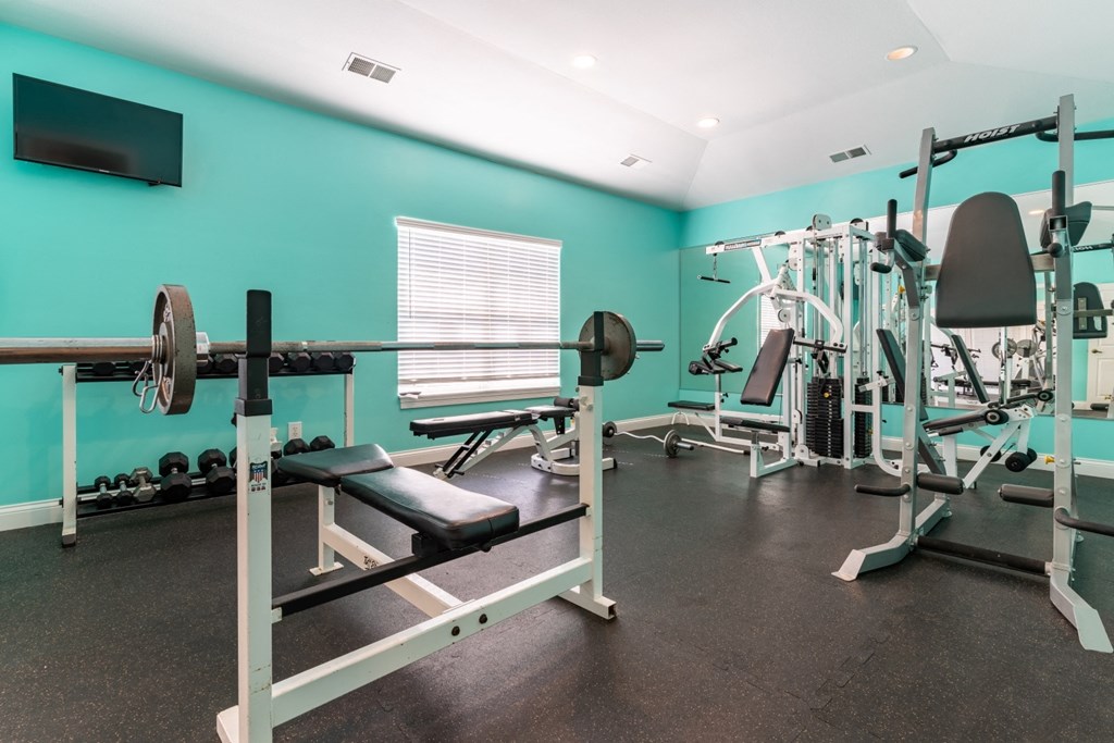Fitness Center with cardio and weightlifting equipment at Barton Farms in Greenwood, IN