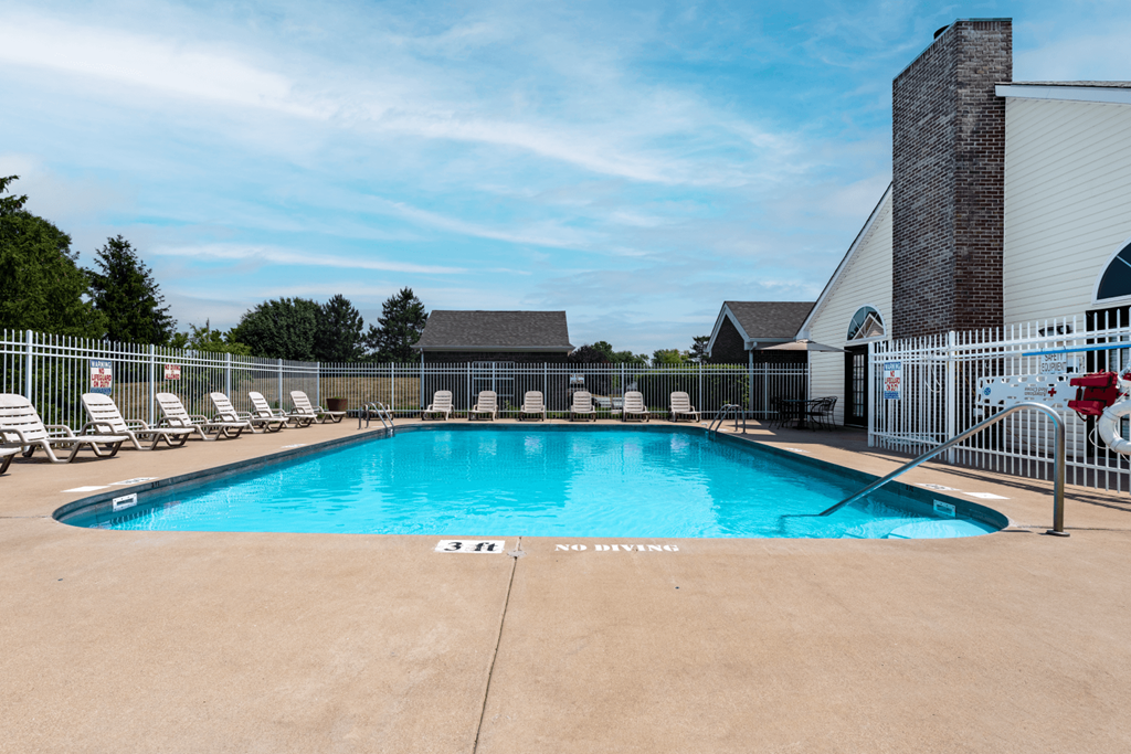 Sparkling pool with sundeck at Barton Farms in Greenwood, IN