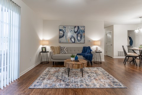a living room with a couch and a table