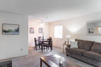 Living Area With Dining at Candlewyck Apartments, Kalamazoo, MI, 49001