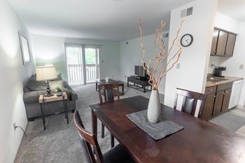a view of the living room from the dining room table