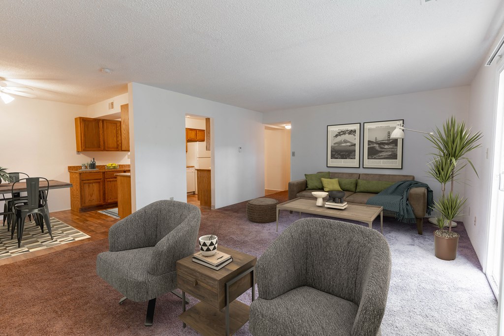 Living Room With Kitchen View at Candlewyck Apartments, Kalamazoo, MI, 49001