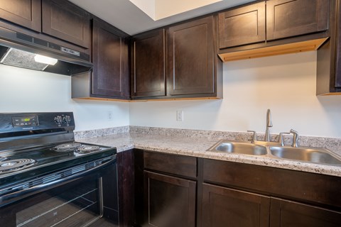 Fully Furnished Kitchen With Stainless Steel Appliances at Olde Towne Apartments, Middletown