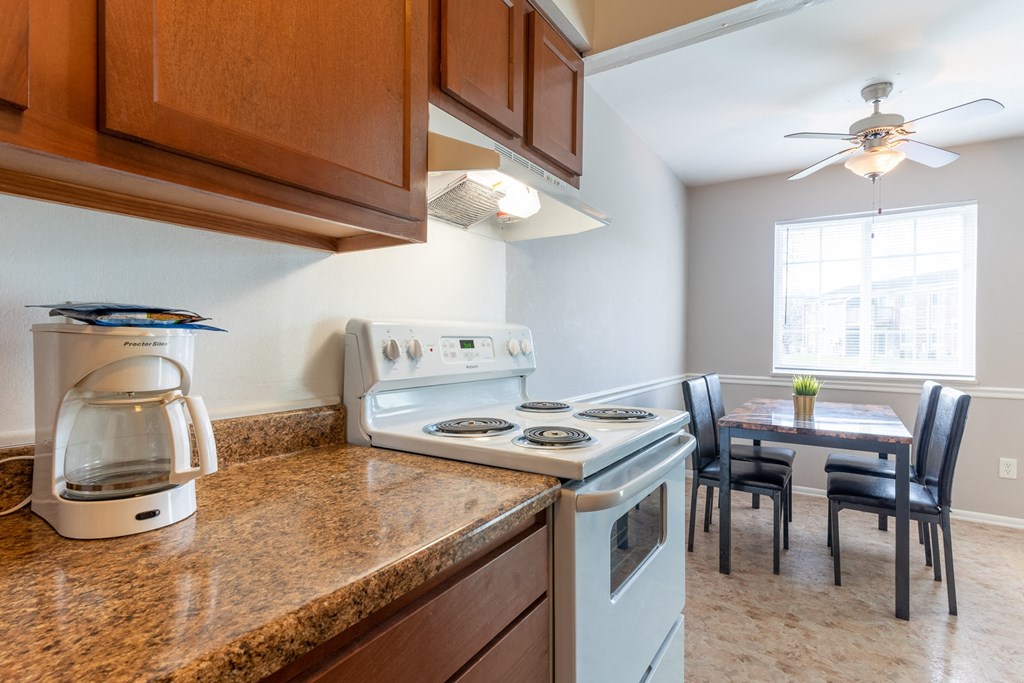 Wooden cabinets in kitchen at Pickwick Farms Apartments, Indiana, 46260