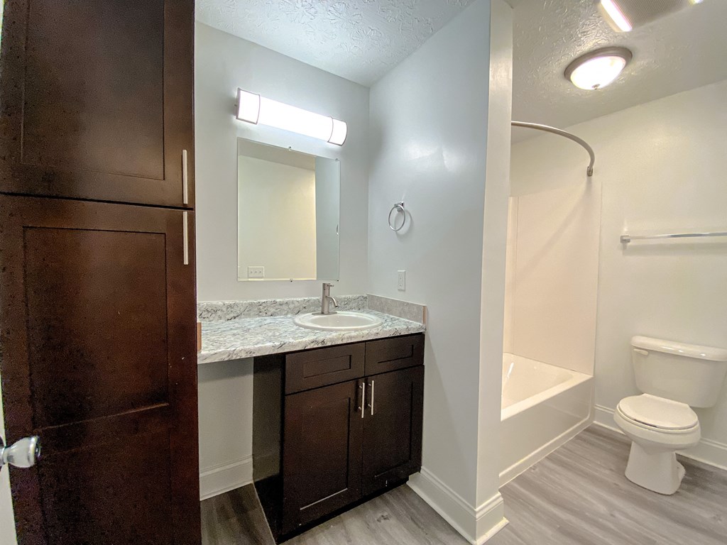 Spacious modern bathroom with storage at Camelot East Apartments, Fairfield, OH, 45014