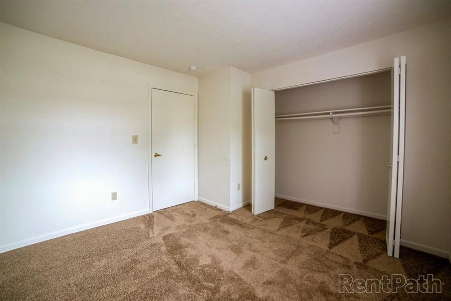 Contemporary Finishes Include Wood And Tile Flooring at Creekside Square Apartments, Indianapolis