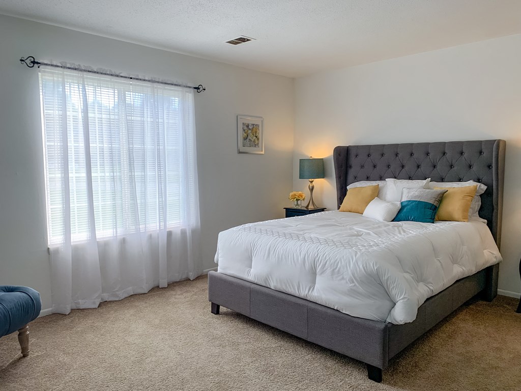 Spacious bedroom with large closet at The Lodge Apartments in Indianapolis, IN