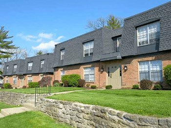 Apartment building exterior with lawn Apartment building exterior with lawn at Olde Towne Apartments in Middletown, OH - Photo Gallery 2