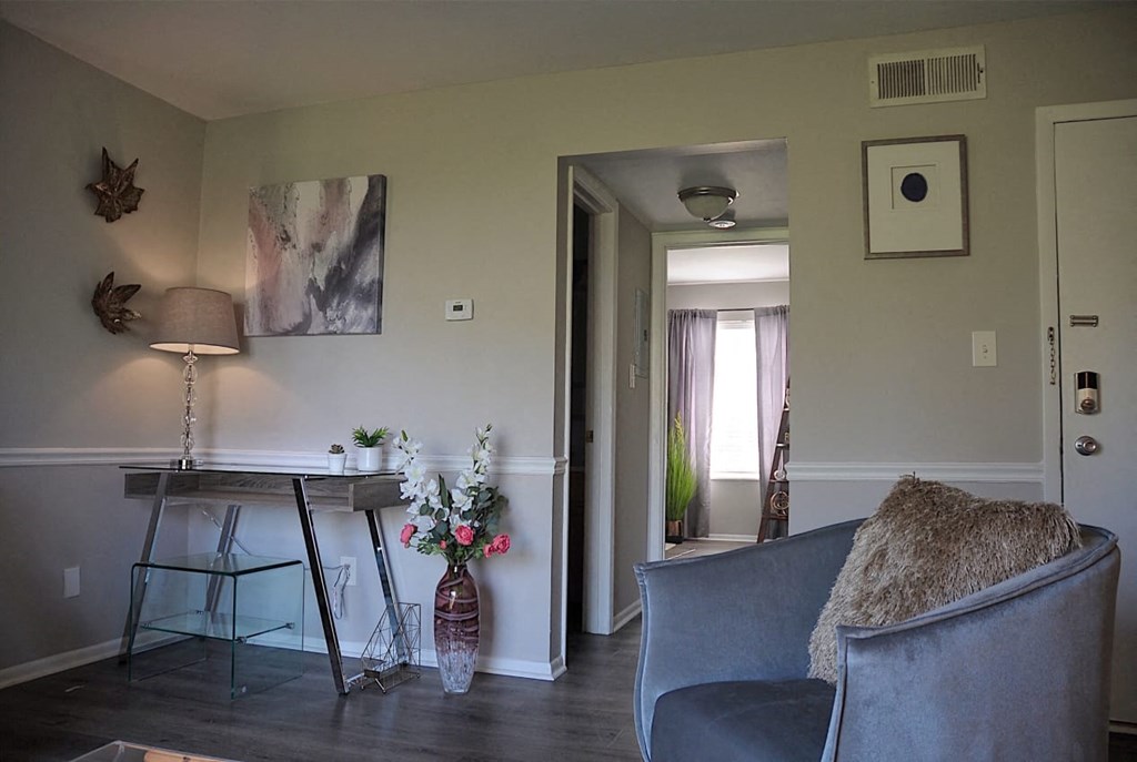 Spacious living room with desk nook at Pickwick Farms Apartments in Indianapolis, IN 46260