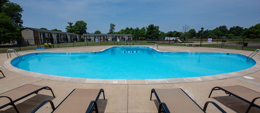 Sparkling pool with sundeck at Pickwick Farms Apartments in Indianapolis, 46260
