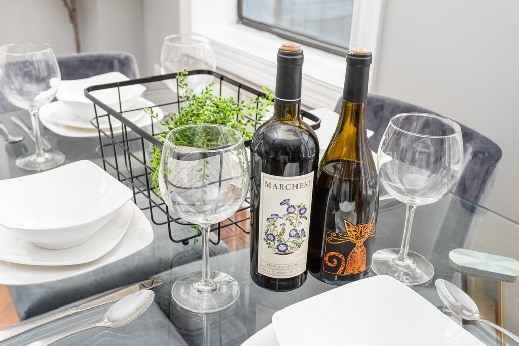 Dining With Wine Bottle at Somerset Place Apartments, Chicago, Illinois
