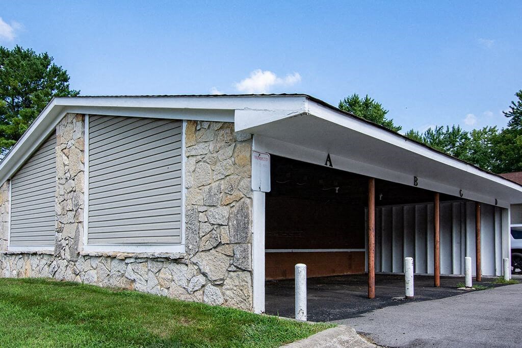 a stone building with a garage
