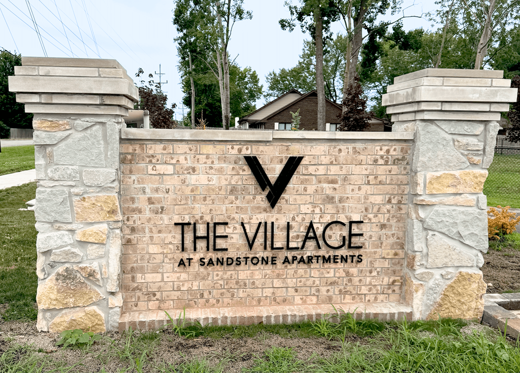 Welcoming Signage at The Village at Sandstone Apartments, Greenwood, IN
