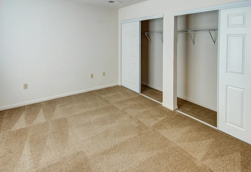 Bedroom with large closets at Walnut Creek Apartments, Kokomo, IN