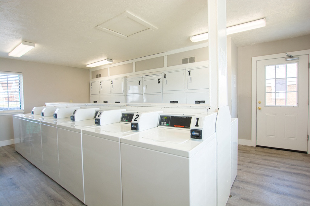 Bright Laundry Room at Waterstone Place Apartments, Indiana