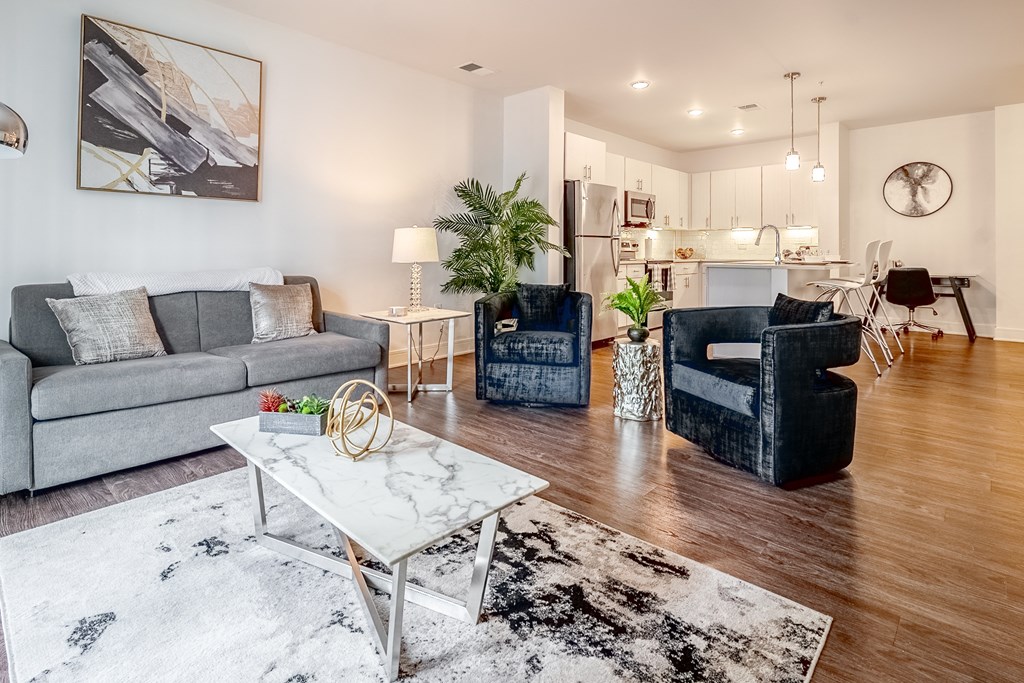 Living Area With Kitchen View at The Whit Apartments, Indianapolis, IN, 46204