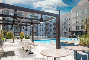 Outdoor Poolside Seating at The Whit Apartments, Indianapolis, 46204 - Photo Gallery 39