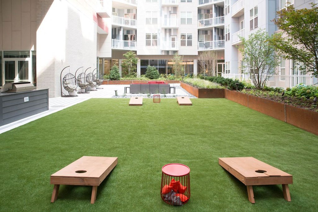 Outdoor Cornhole Game at The Whit Apartments, Indianapolis, 46204