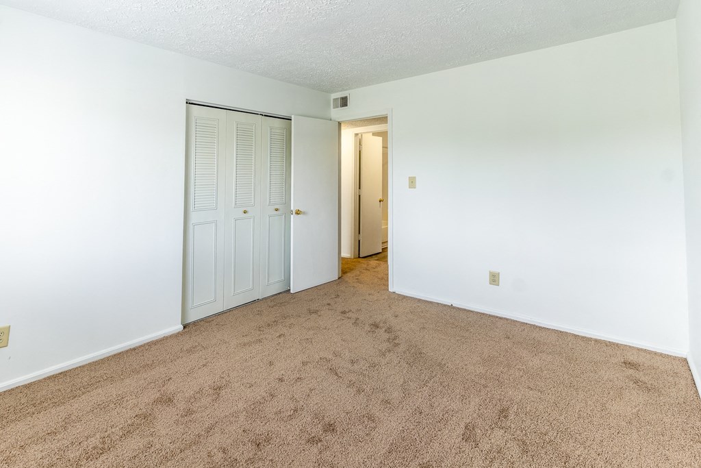 an empty living  at Lake Camelot Apartments, Indiana