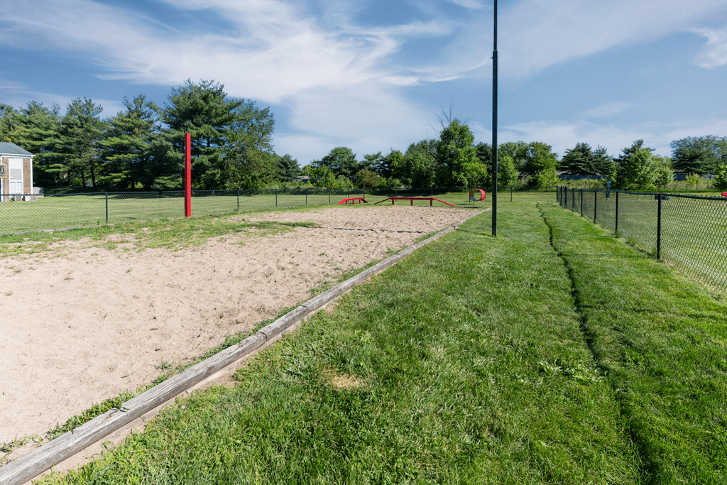 a sand volleyball court  at Pickwick Farms Apartments, Indianapolis, Indiana 