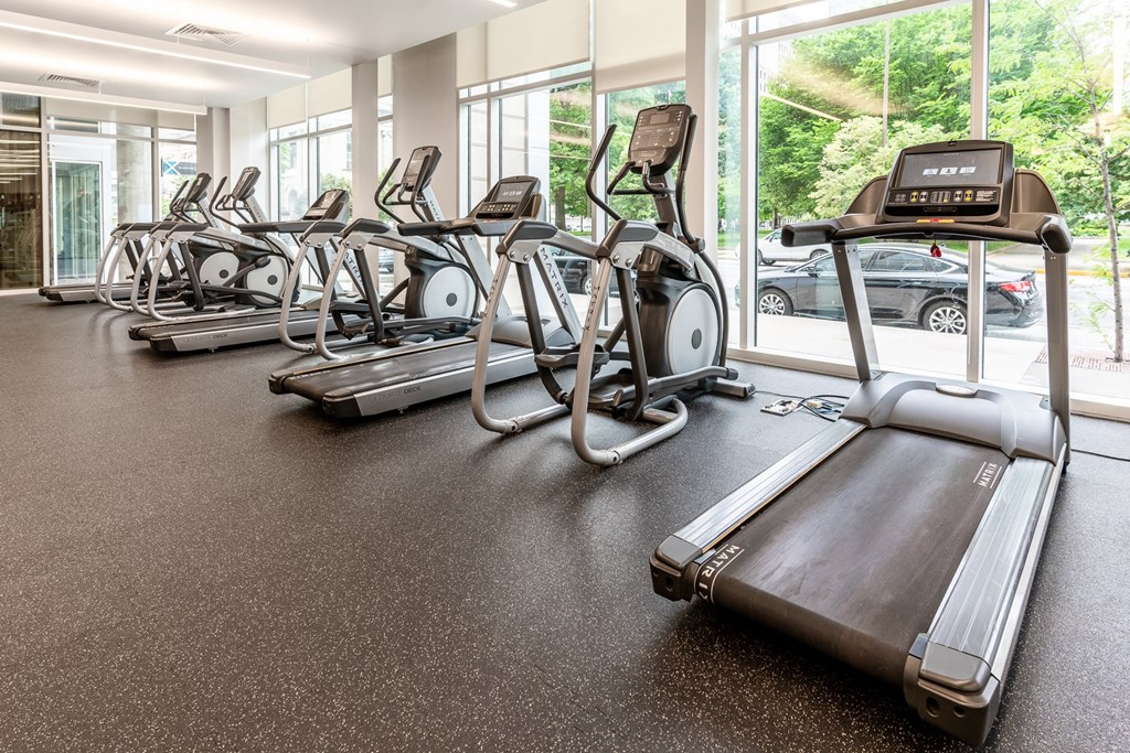 a gym with cardio equipment at The Whit Apartments, Indianapolis