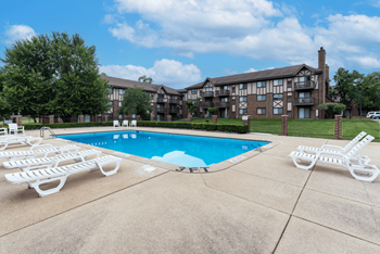 our apartments offer a swimming pool with chaise lounge chairs