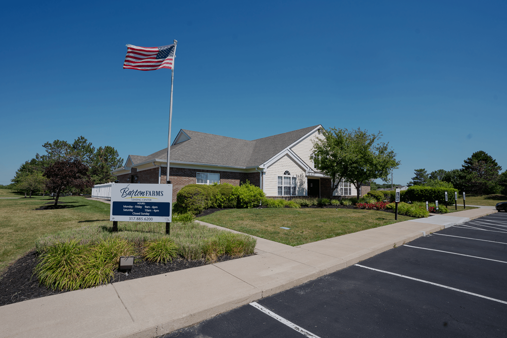 a house with an flag flying in front of it at Barton Farms in Greenwood, IN 46143