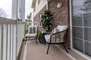Screened-in private balcony with storage closet at Barton Farms in Greenwood, IN