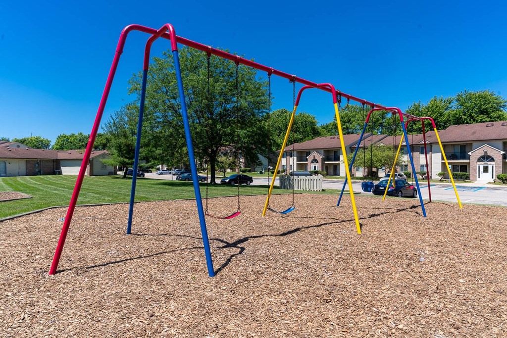 a swing set at a playground at Creekside Square Apartments, Indianapolis Indiana