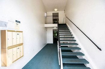 a set of stairs in a white building