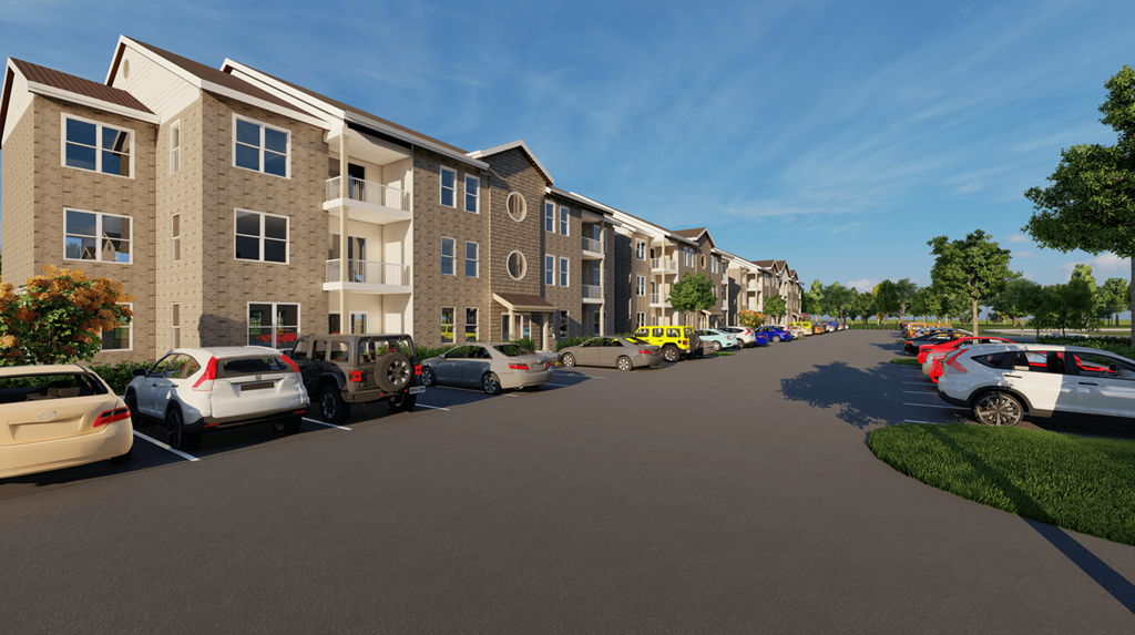 an empty parking lot in front of an apartment building