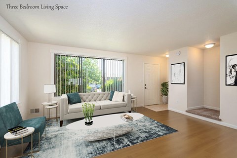 a living room with a couch and a table