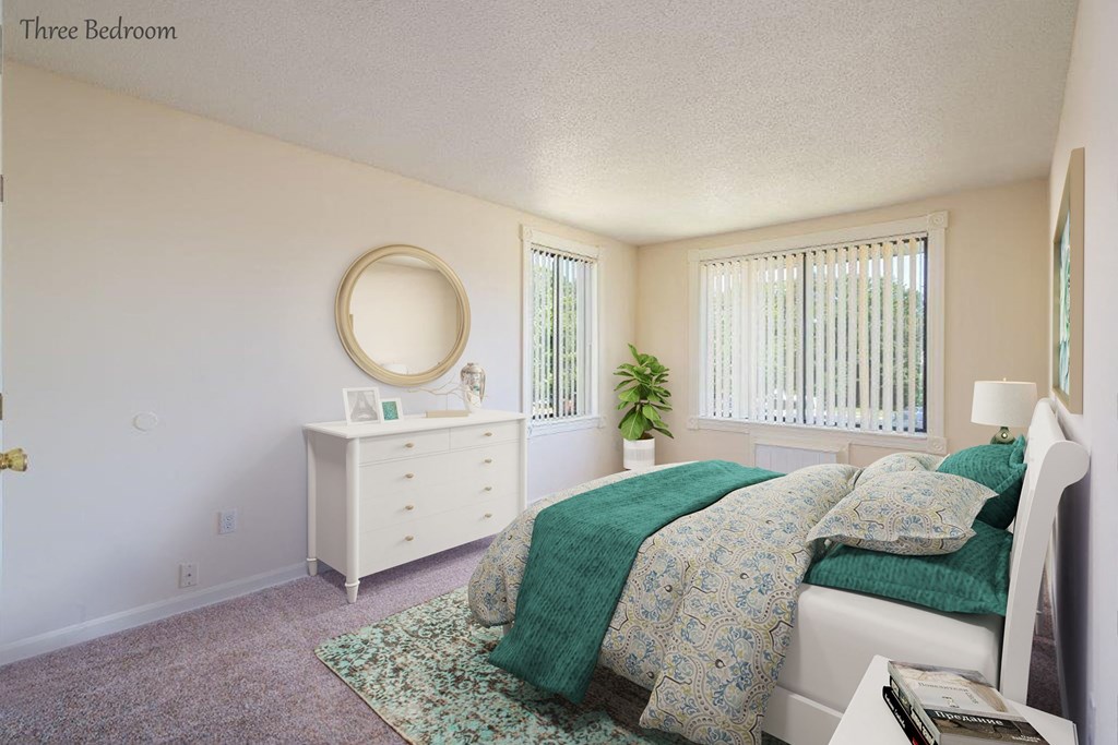 a bedroom with a bed and a white dresser
