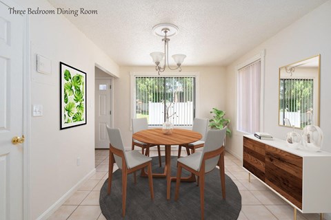 a dining room with a wooden table and chairs