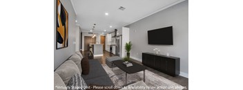 a living room with a couch and a coffee table at Nineteen North Apartments , Buffalo, NY, 14202