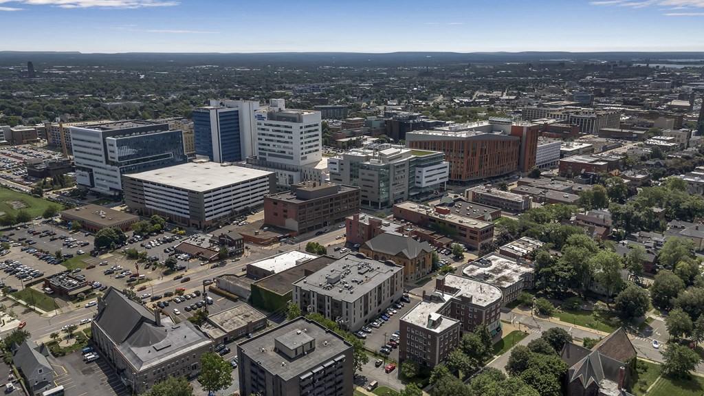 an aerial view of a city with tall buildings and cars at Nineteen North, Buffalo, NY, 14202