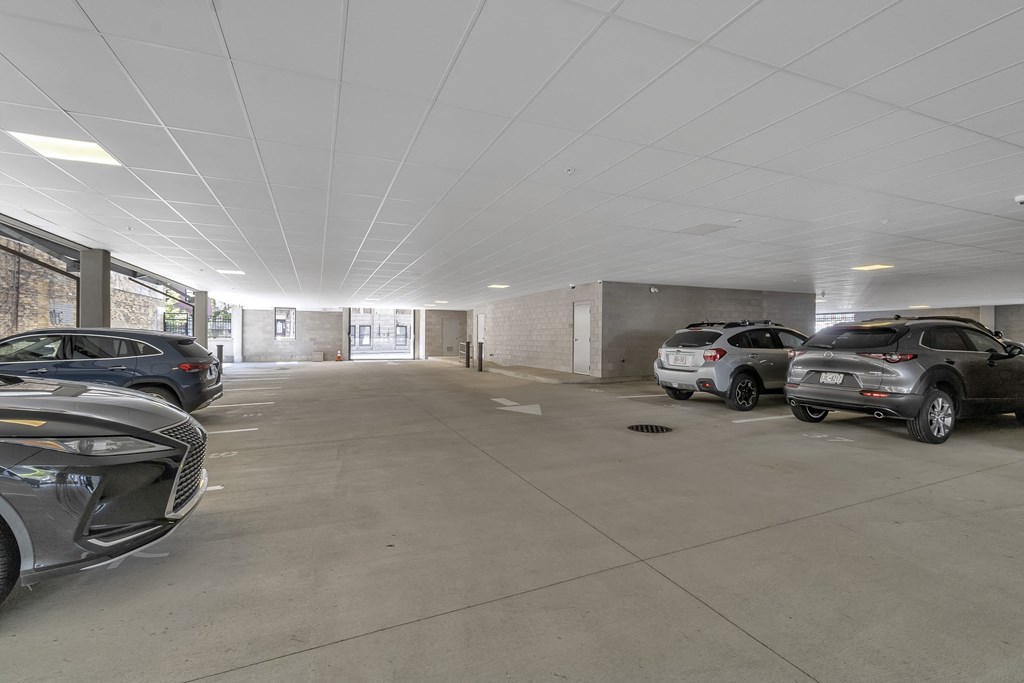 a parking garage with cars parked in it at Nineteen North, Buffalo