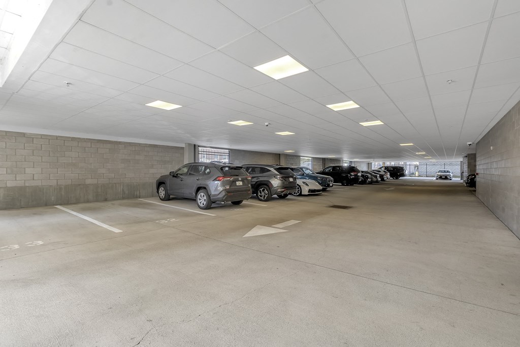 an empty parking garage with cars parked in it at Nineteen North, Buffalo, NY