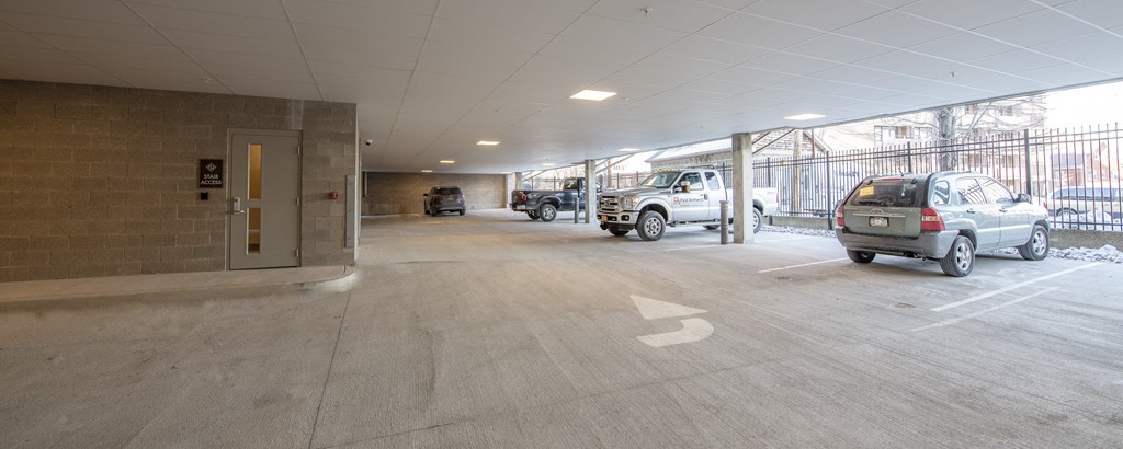 a parking garage with cars parked in it at Nineteen North, Buffalo, NY