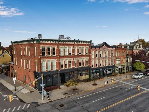 Historic brick buildings at urban street corner at The Granite Works Apartments, Buffalo, NY 14202
