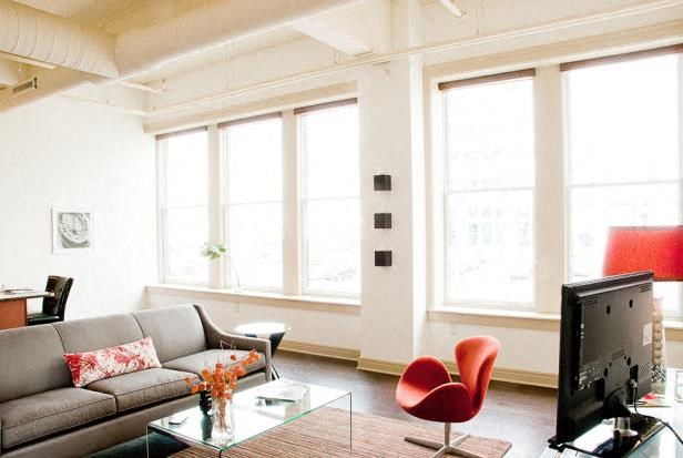 a living room with a couch and a television
