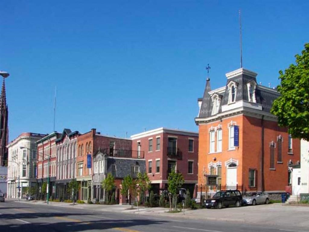 a row of brick buildings on a city street