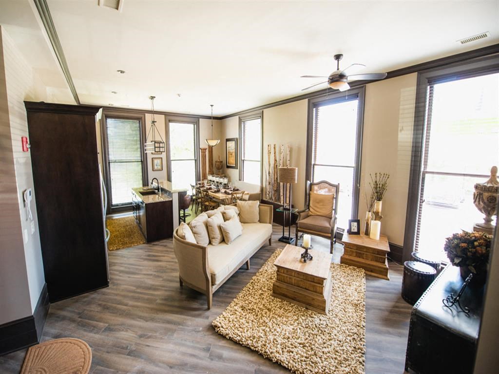 a living room with a couch and a table