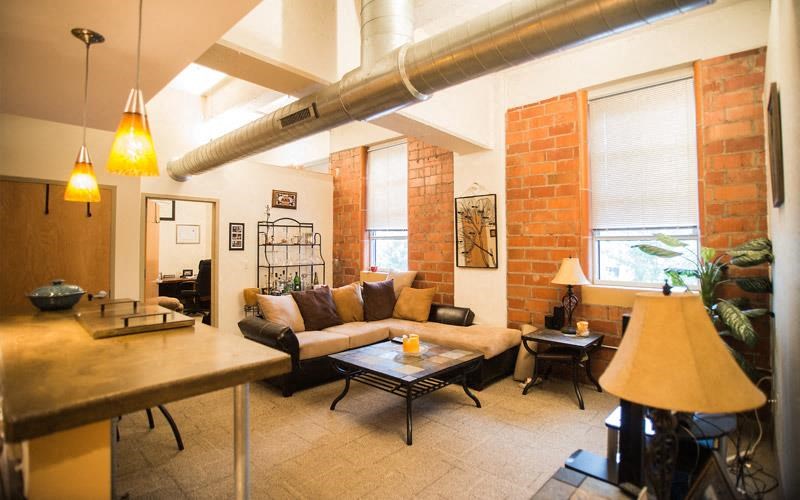 a living room with a couch and a table