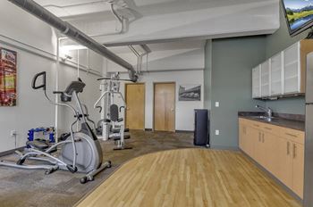 Gym with a exercise bike at The Lofts at Elk Terminal, Buffalo, NY, New York