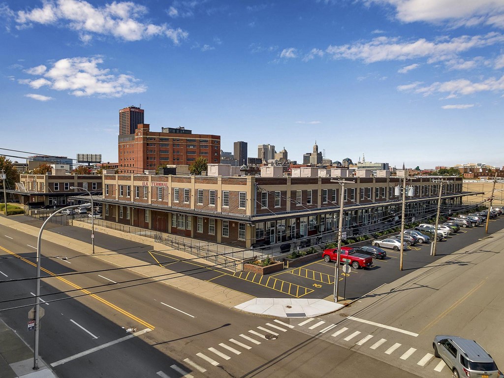 an aerial view of a city street and a large building at The Lofts at Elk Terminal, Buffalo, NY, New York, 14204