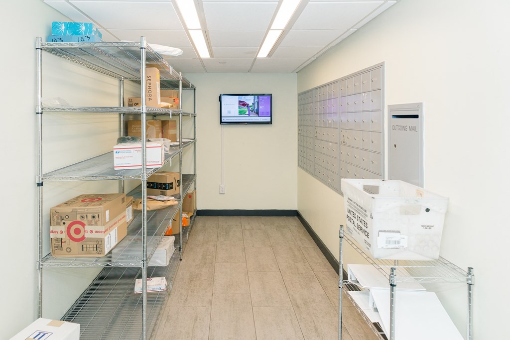 A storage room with shelves and boxes at Walnut Towers at Frick Park, Pittsburgh, Pennsylvania