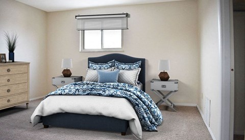 a bedroom with a bed and two night stands